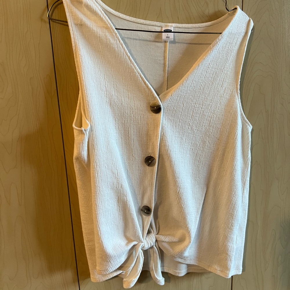Cotton cream/ivory colored button down tank top!